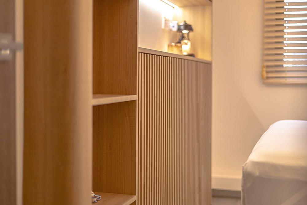 Eclectic Bedroom with Storage Cabinets and Display Cabinets