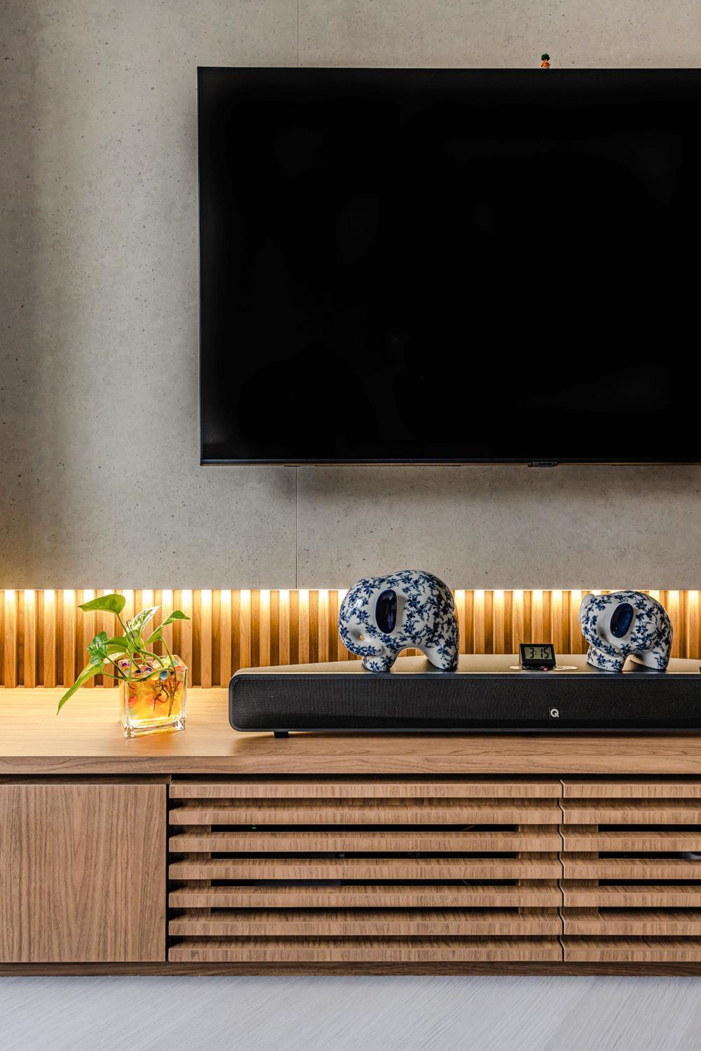 Eclectic Living Room with TV Console and Feature Wall