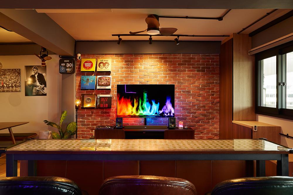 Industrial Living Room with TV Console and Feature Wall