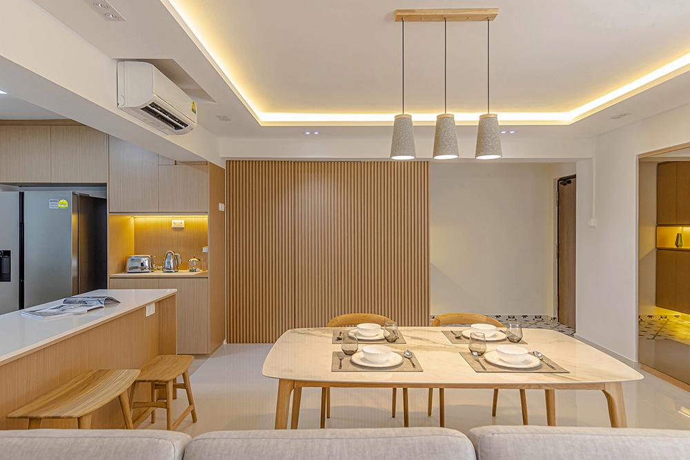 Scandinavian Dining Room with Open Kitchen and Lighting