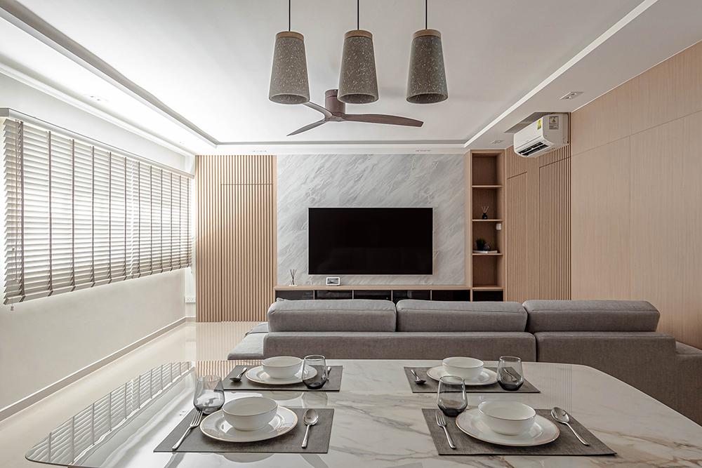 Scandinavian Living Room with Homogeneous Tiles and TV Console