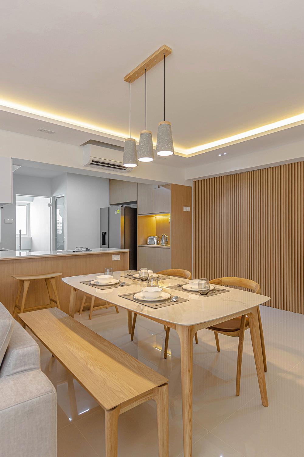 Scandinavian Dining Room with Homogeneous Tiles and Feature Wall