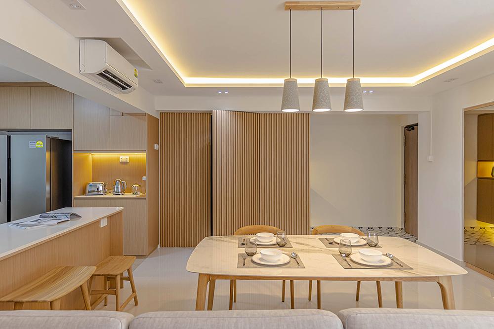 Scandinavian Dining Room with Open Kitchen and Lighting