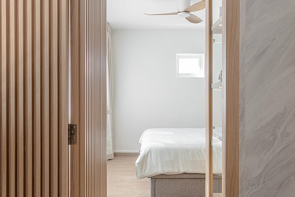 Scandinavian Bedroom with Vinyl Flooring and Feature Wall