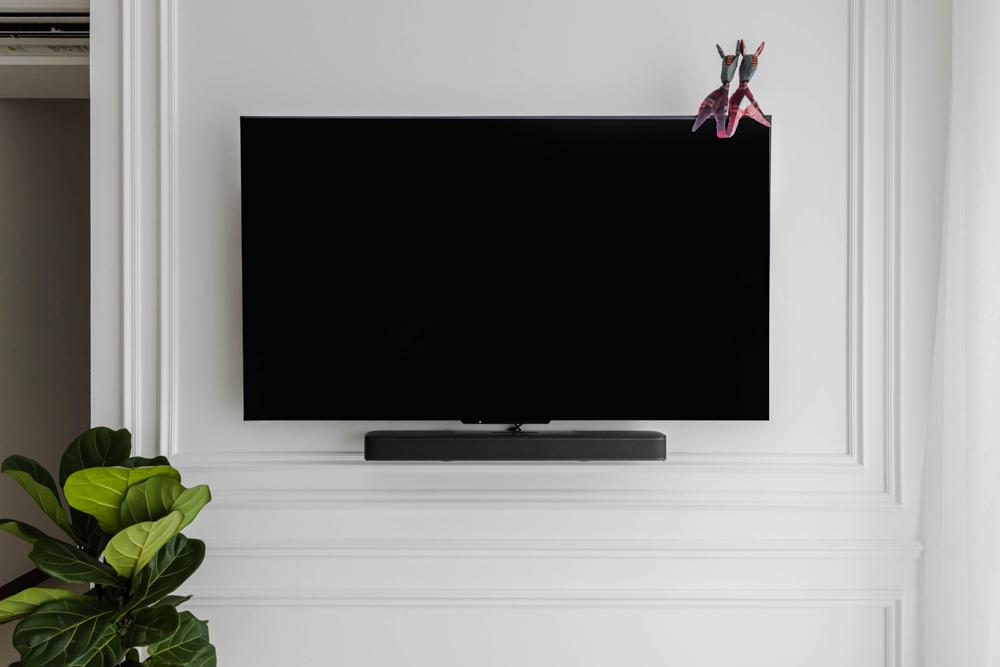 Transitional Living Room with Feature Wall and Paintings