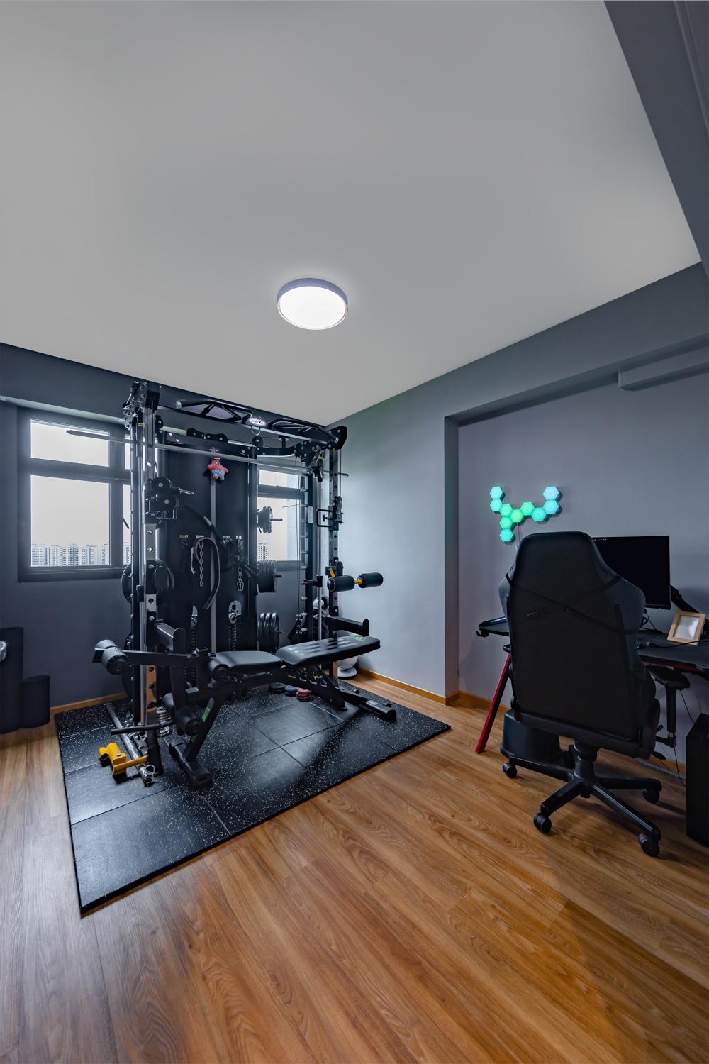 Modern Home Gym with Vinyl Flooring and Paintings