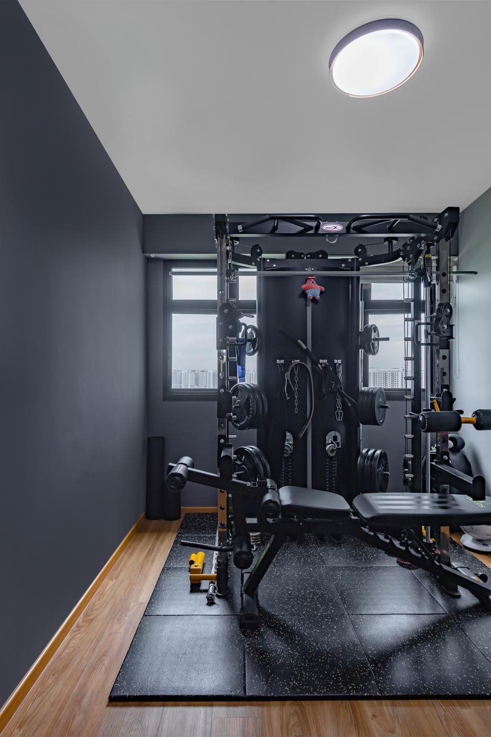 Modern Home Gym with Vinyl Flooring and Paintings