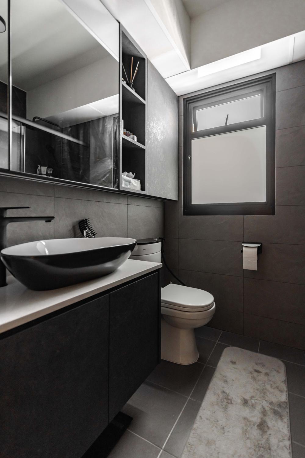 Industrial Bathroom with Homogeneous Tiles and Mirror