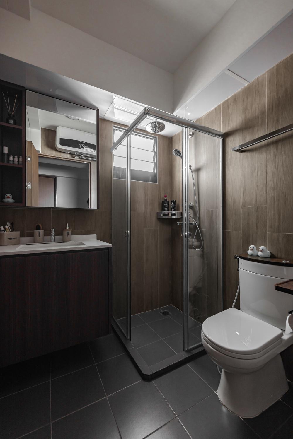 Industrial Bathroom with Homogeneous Tiles and Mirror