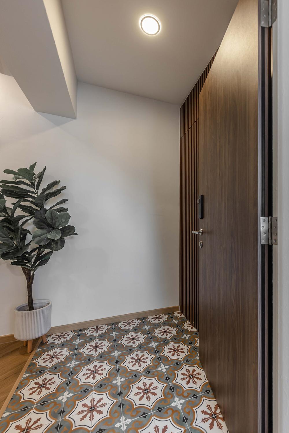 Transitional Foyer with Homogeneous Tiles and Tiles