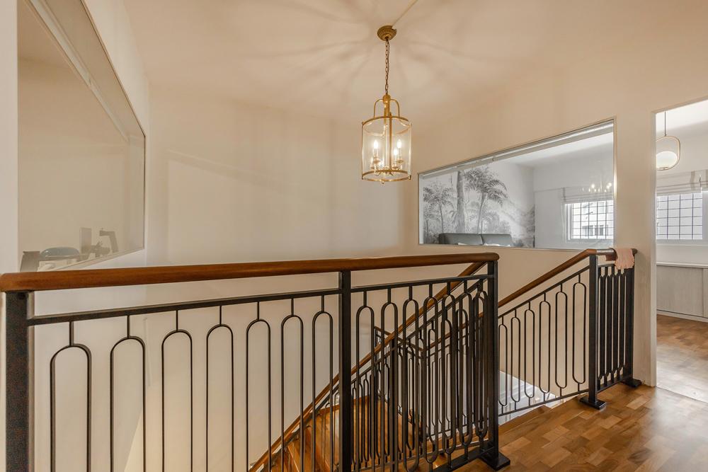 Transitional Hallway with Parquet Floor and Flooring