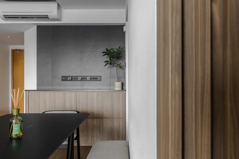 Contemporary Dining Room with Feature Wall and Storage Cabinets