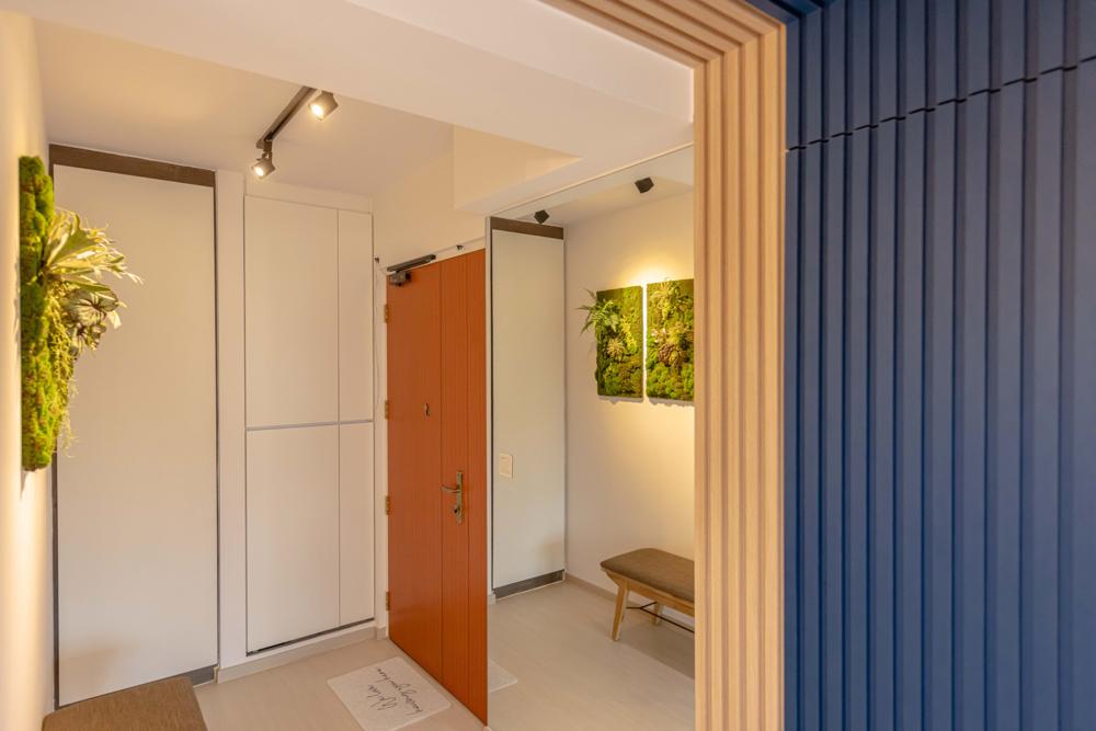 Modern Foyer with Feature Wall and Mirror