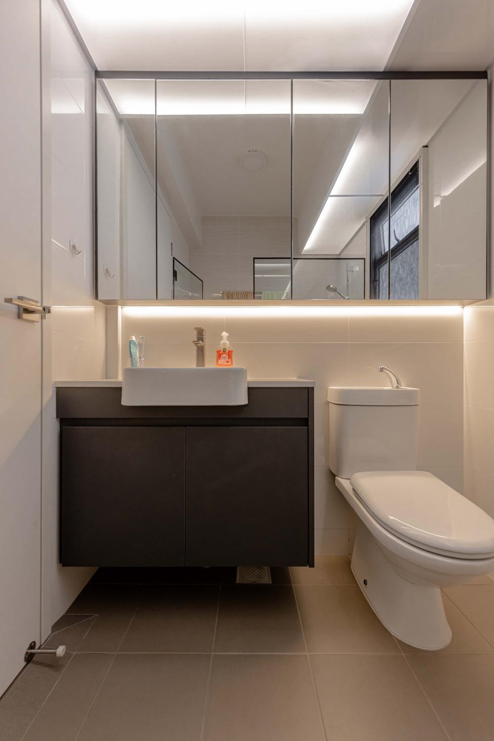 Scandinavian Bathroom with Homogeneous Tiles and Mirror