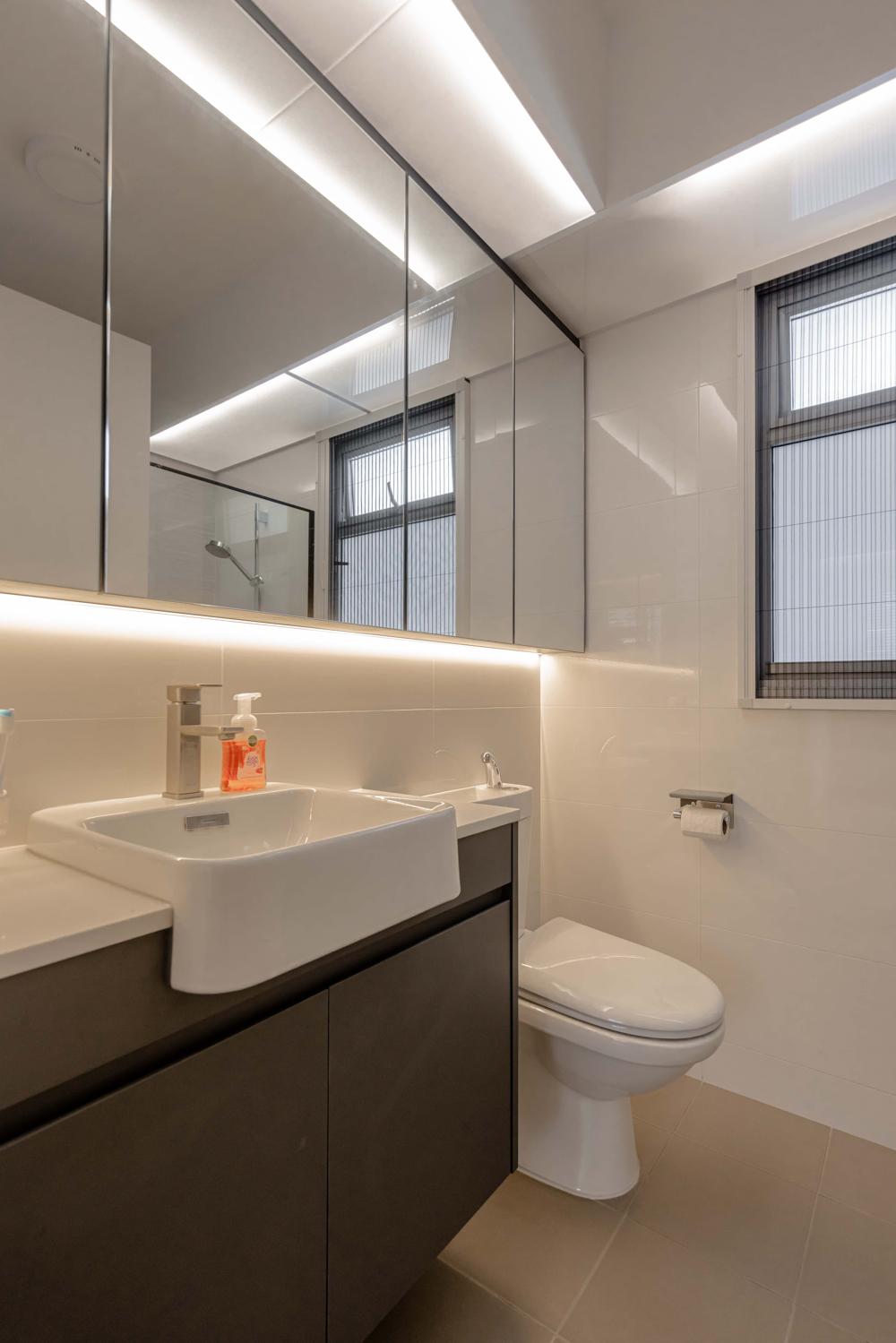 Scandinavian Bathroom with Homogeneous Tiles and Mirror