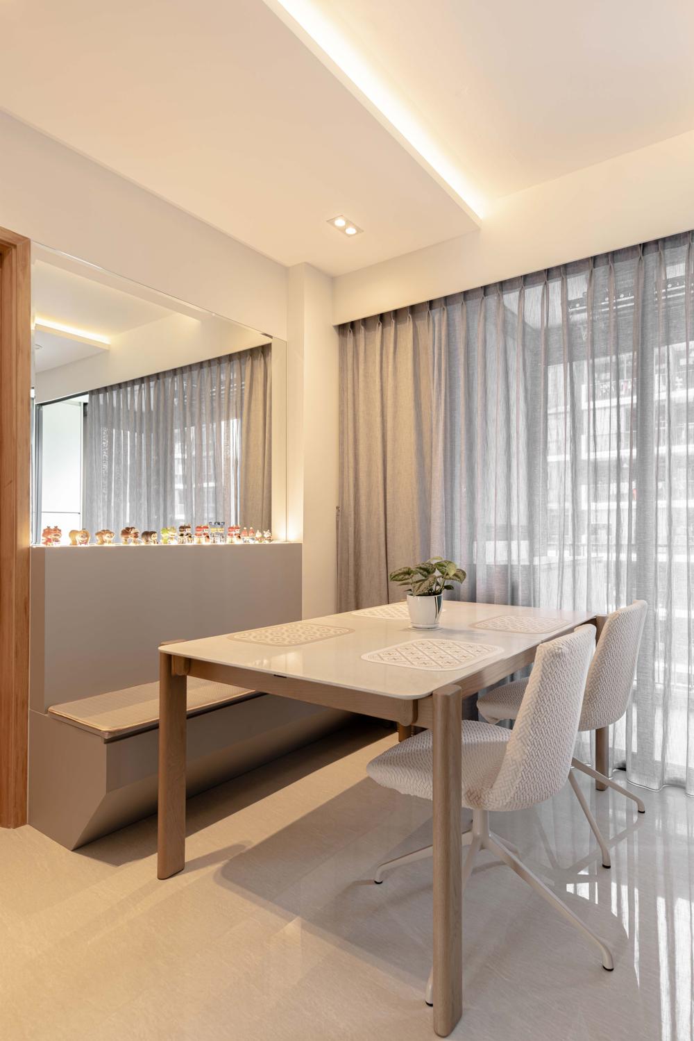 Modern Dining Room with Mirror and Cove Lighting