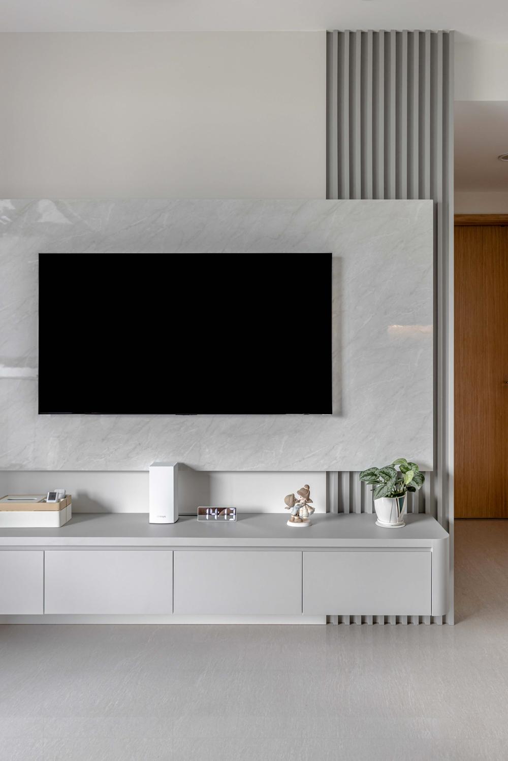 Modern Living Room with Homogeneous Tiles and TV Console