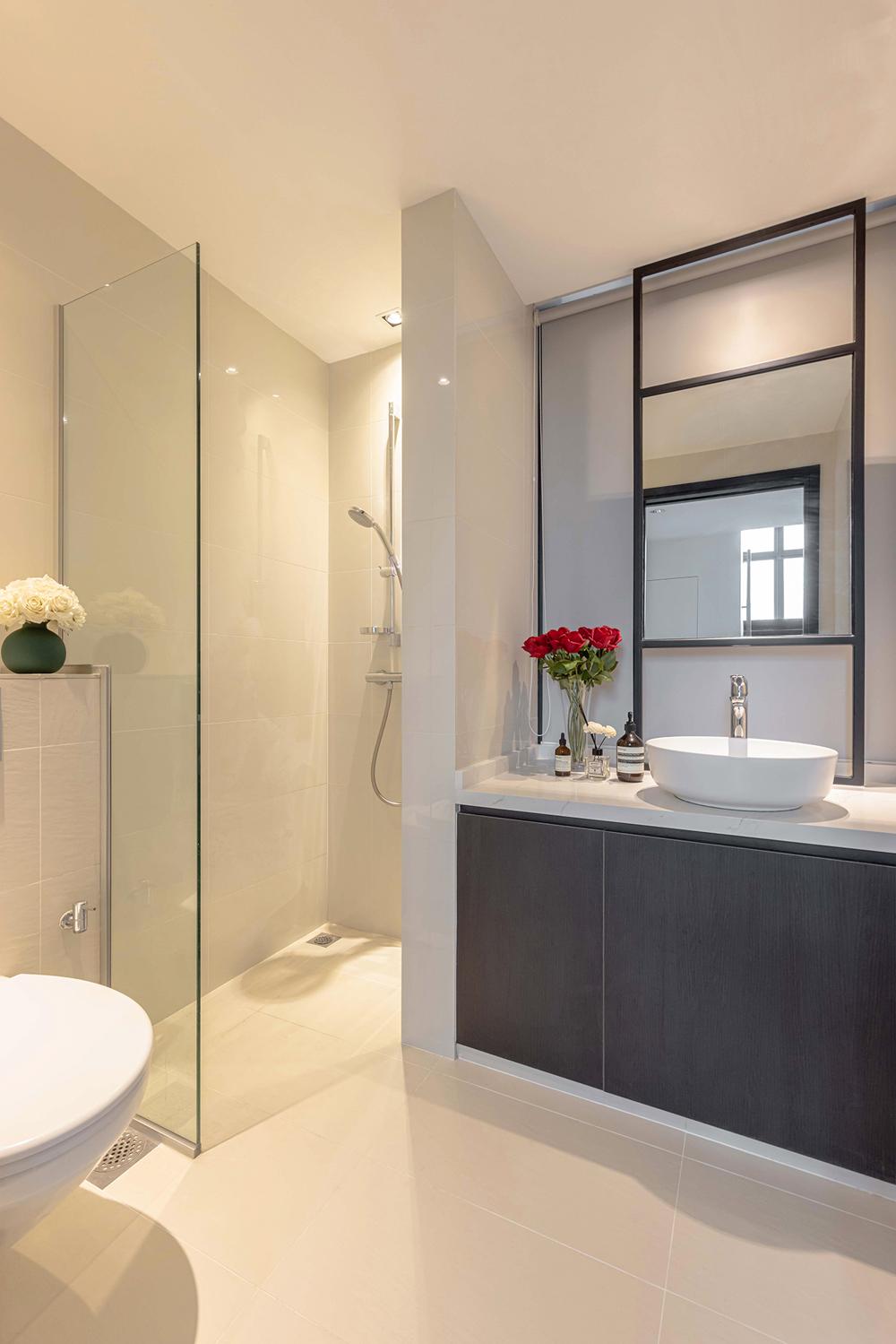 Modern Bathroom with Homogeneous Tiles and Mirror