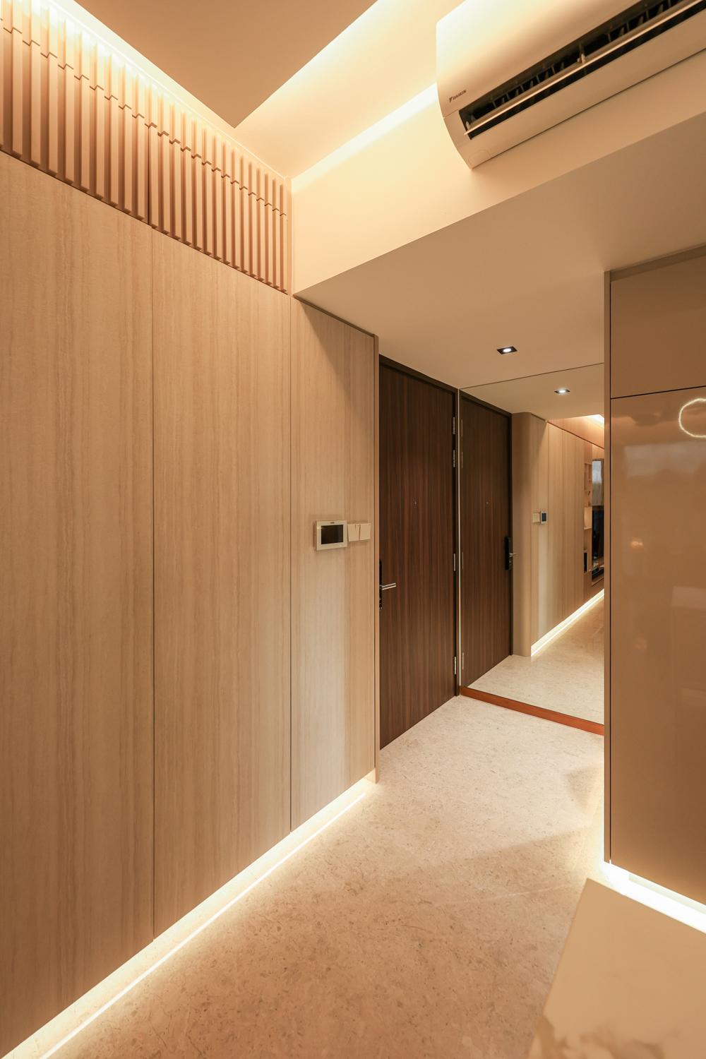 Modern Foyer with Mirror and Cove Lighting