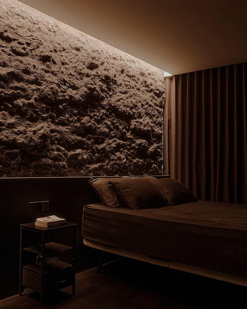 Contemporary Bedroom with Granite Floor and Built-in Bed