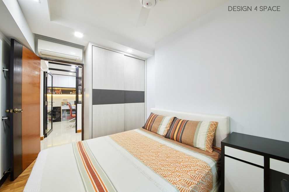 Modern Bedroom with Wood Flooring and Drop Light