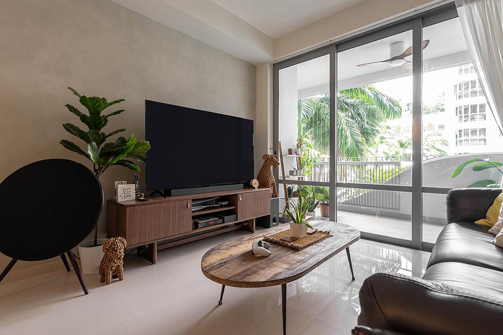 Modern Living Room with Homogeneous Tiles and Paintings