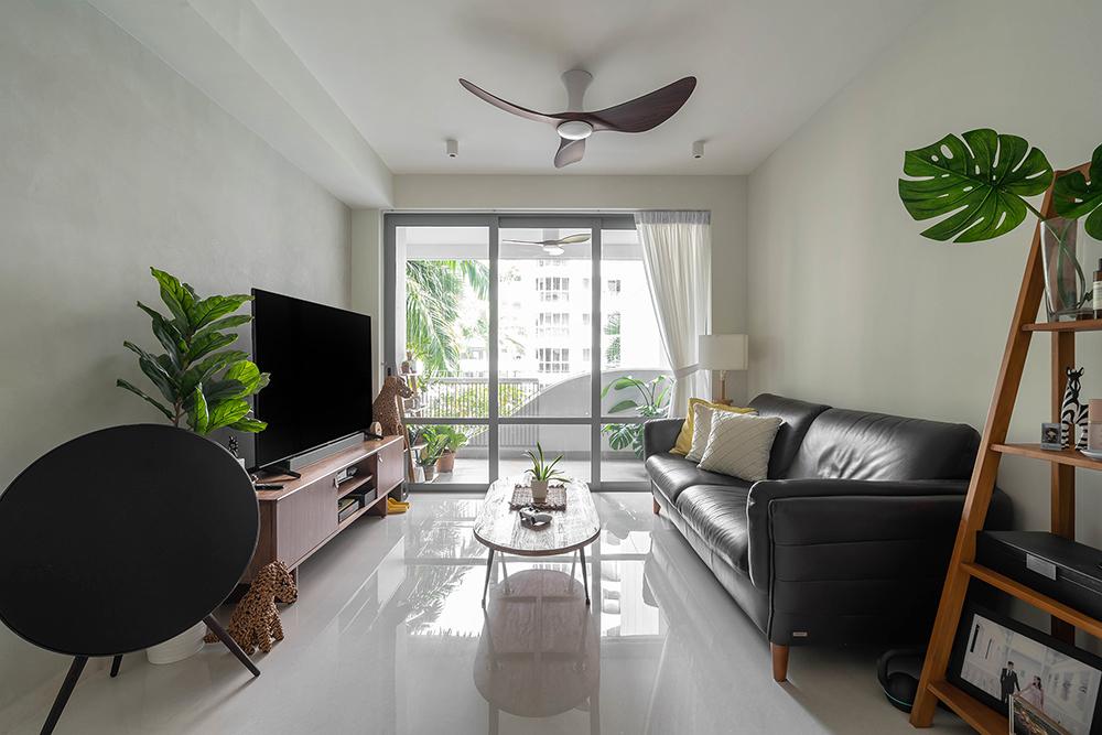 Modern Living Room with Paintings and Houseplants