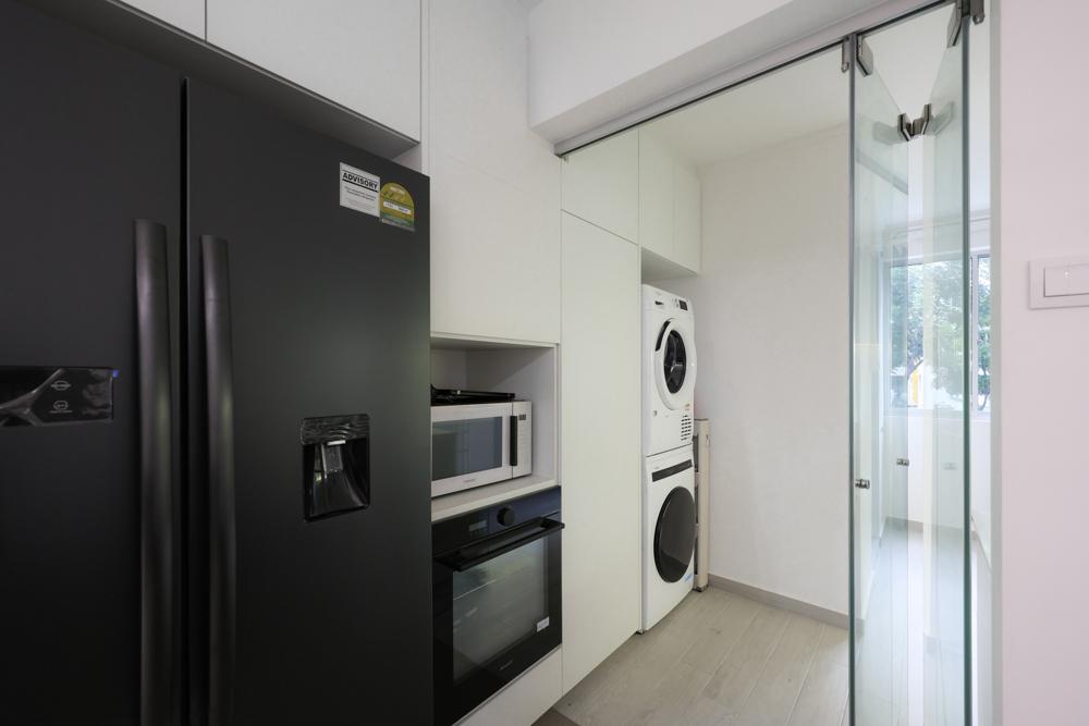 Modern Kitchen with Glass Door and Laundry Area