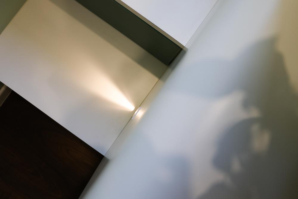 Asian Bedroom with Storage Cabinets and Lighting
