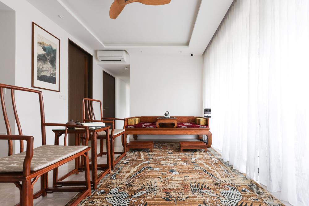 Asian Living Room with Curtain and Rugs