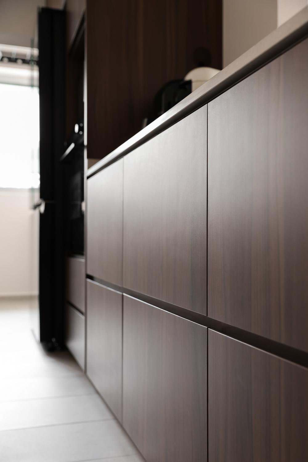 Modern Kitchen with Homogeneous Tiles and Storage Cabinets