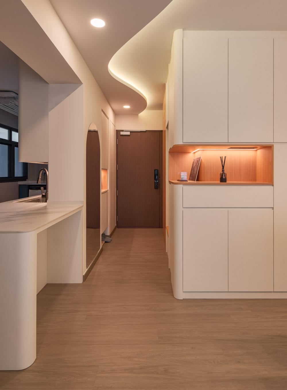 Minimalist Foyer with Feature Wall and Mirror