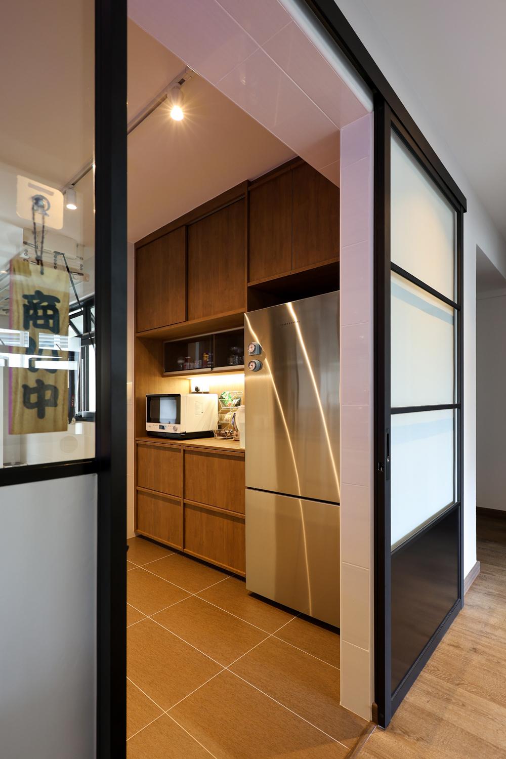 Industrial Kitchen with Homogeneous Tiles and Glass Door