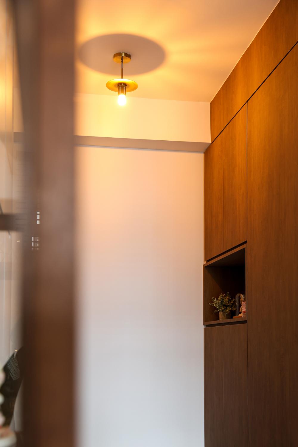 Industrial Foyer with Shoe Cabinets and Lighting