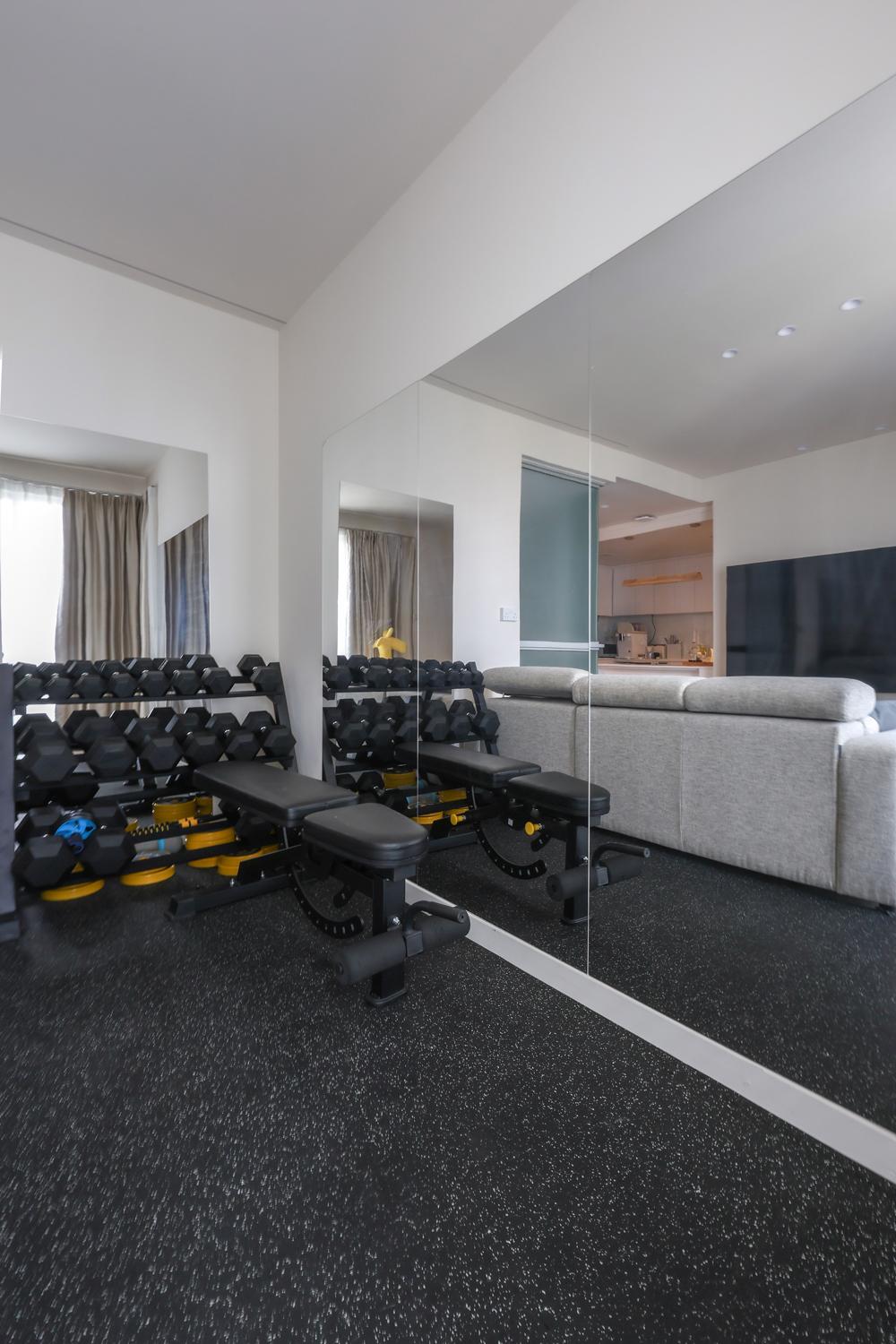 Modern Home Gym with Mirror and Seating Bench