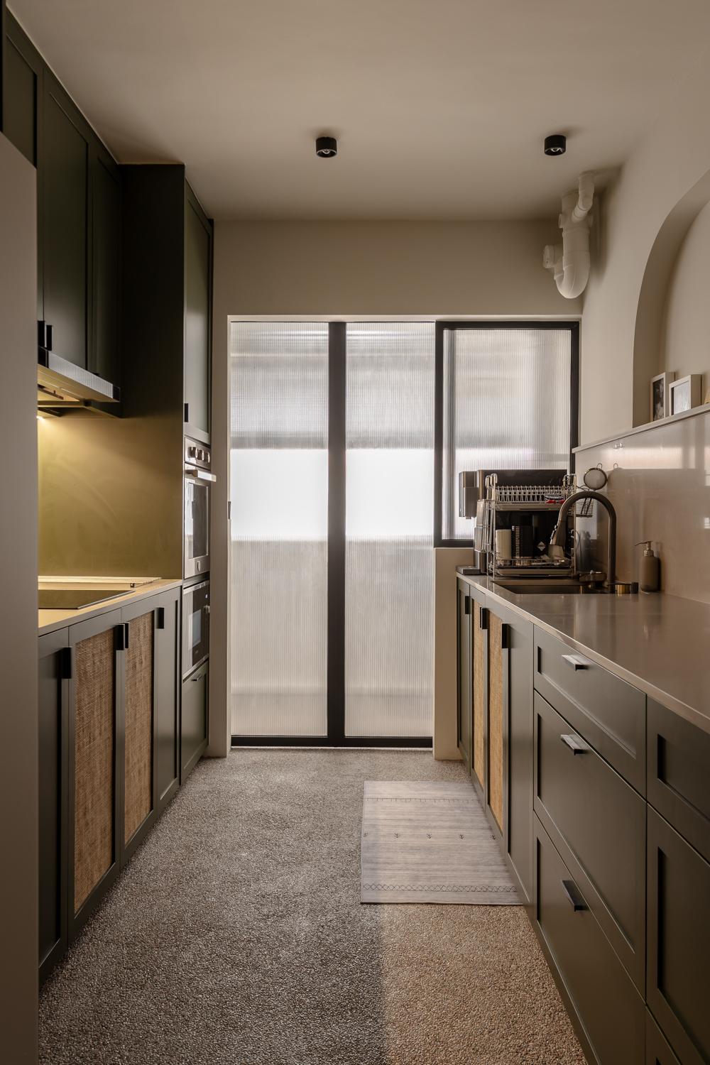 Modern Kitchen with Countertop and Glass Door
