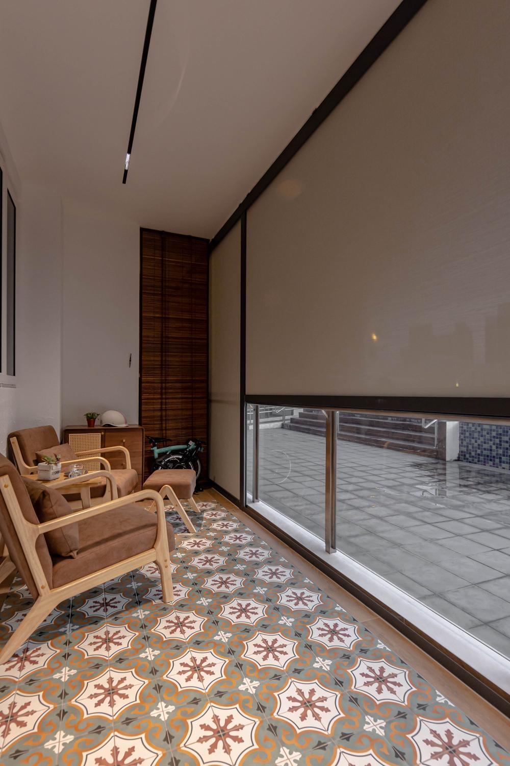 Asian Balcony with Homogeneous Tiles and Outdoor Chairs