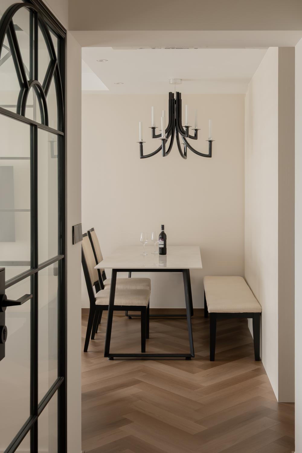 Vintage Dining Room with Herringbone Tiling and Glass Door