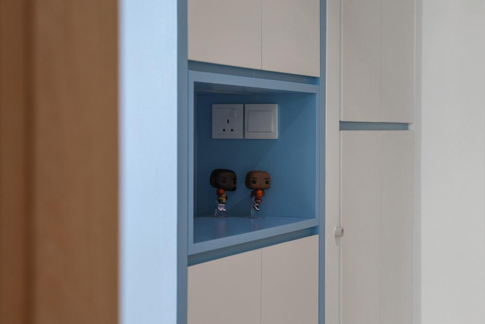 Modern Foyer with Artwork and Storage Cabinets