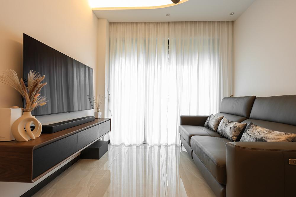 Modern Living Room with TV Console and Cove Lighting