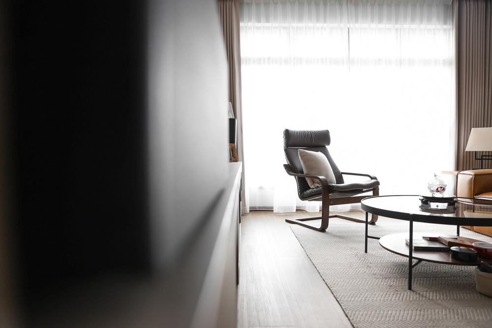 Asian Living Room with Vinyl Flooring and Rugs