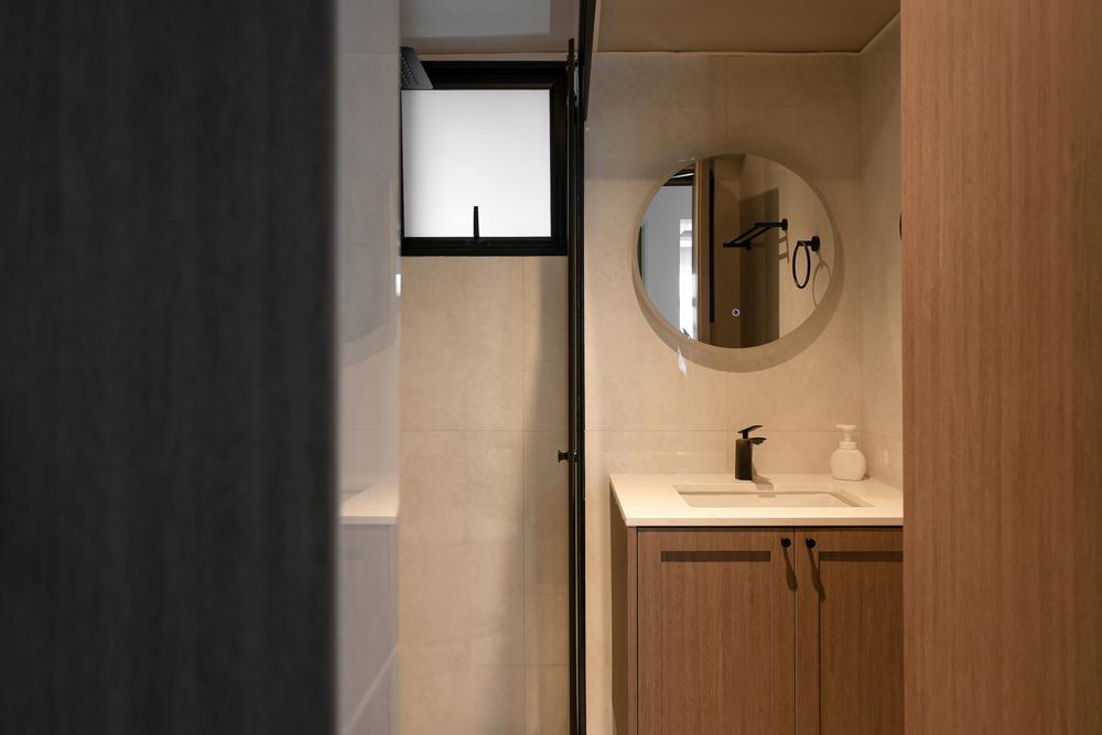 Asian Bathroom with Homogeneous Tiles and Mirror