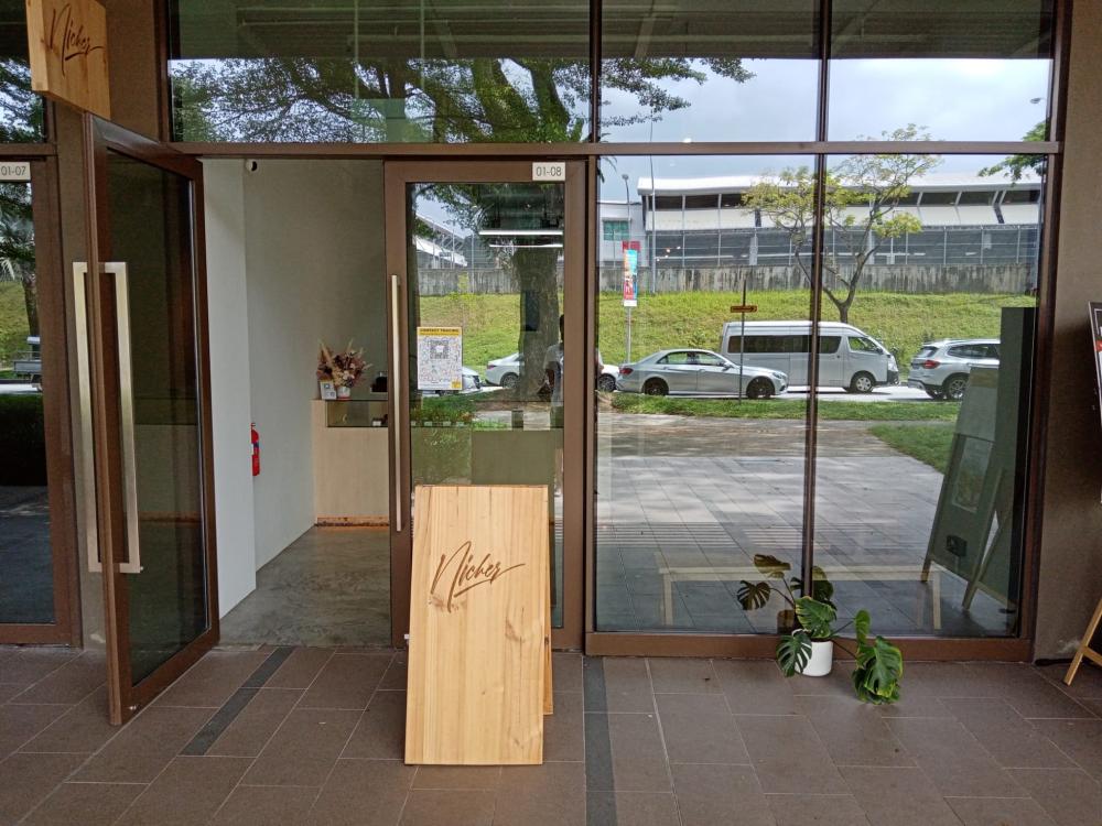 Minimalist Shopfront with Glass Door and Display Cabinets