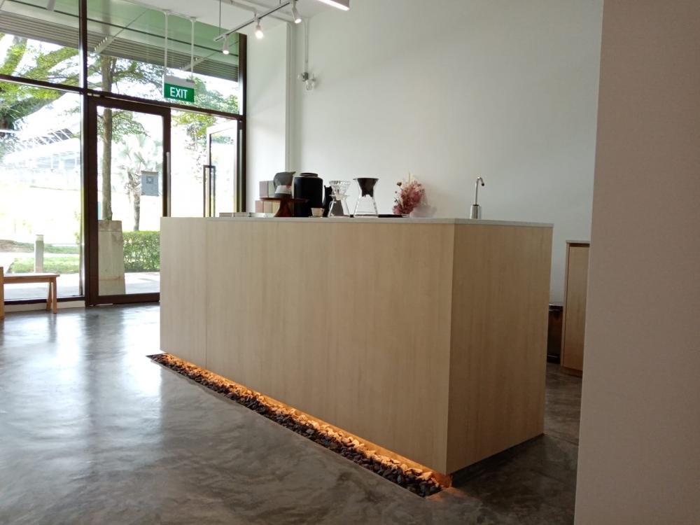 Minimalist Retail with Cement Floor and Flooring