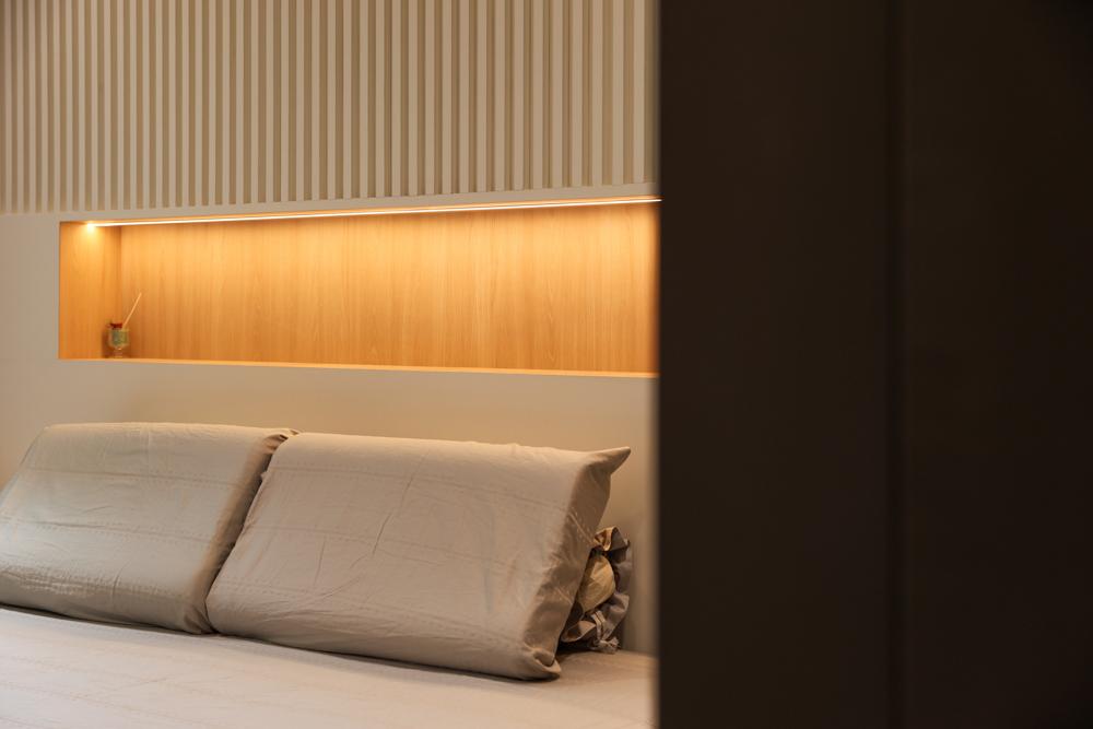 Minimalist Bedroom with Feature Wall and Lighting