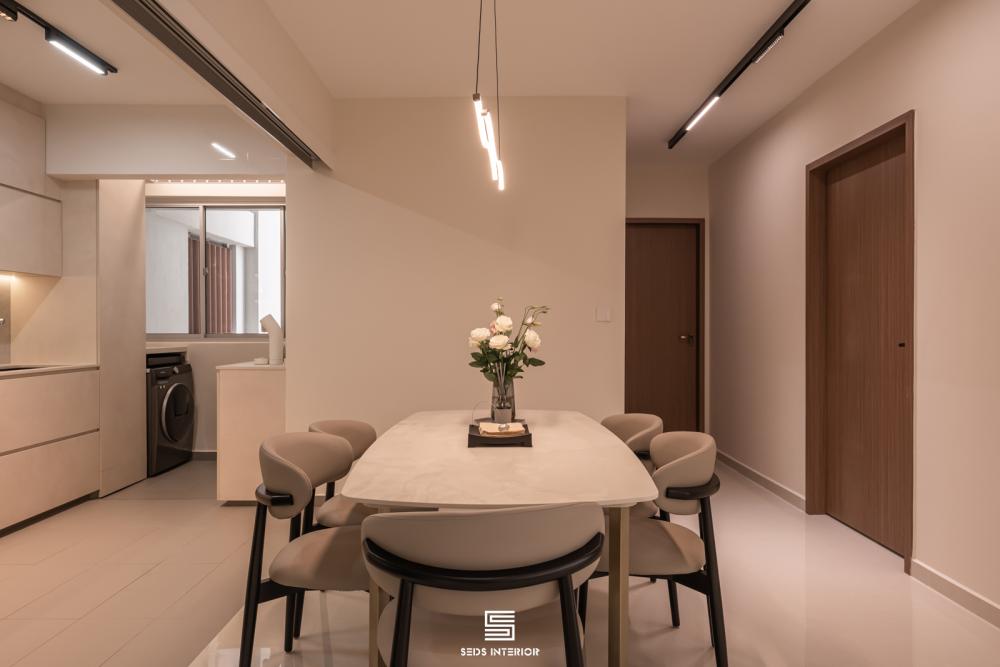 Minimalist Dining Room with Drop Light and Dining Table