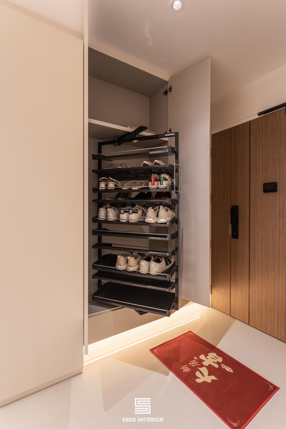 Minimalist Hallway with Bookshelf and Artwork