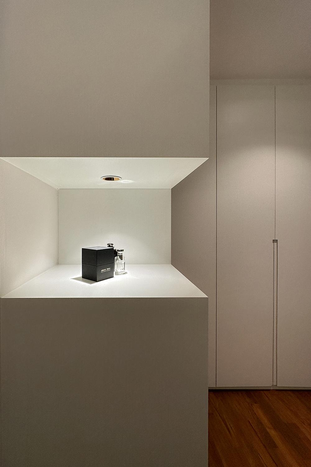 Minimalist Bedroom with Wardrobe and Display Cabinets