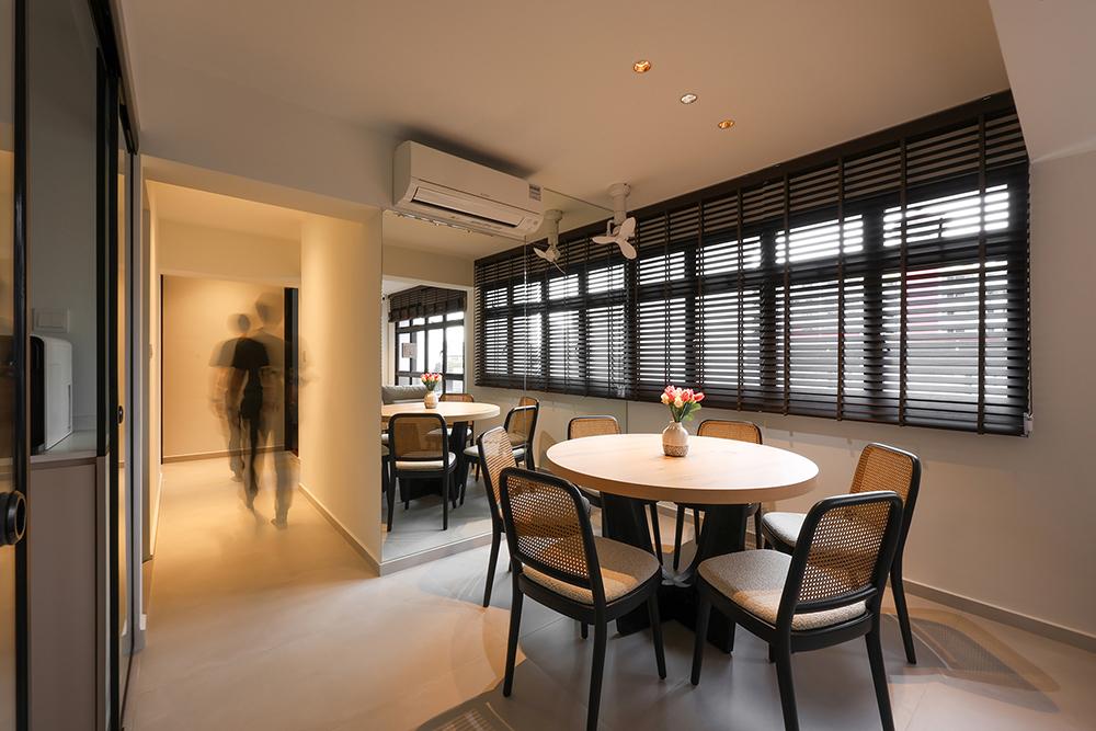 Minimalist Dining Room with Homogeneous Tiles and Mirror