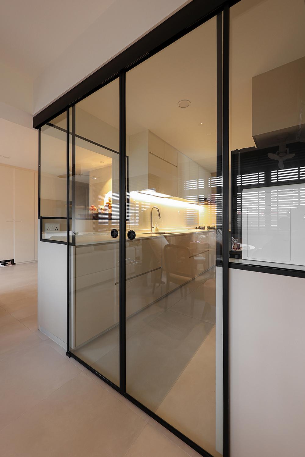 Minimalist Kitchen with Homogeneous Tiles and Glass Door